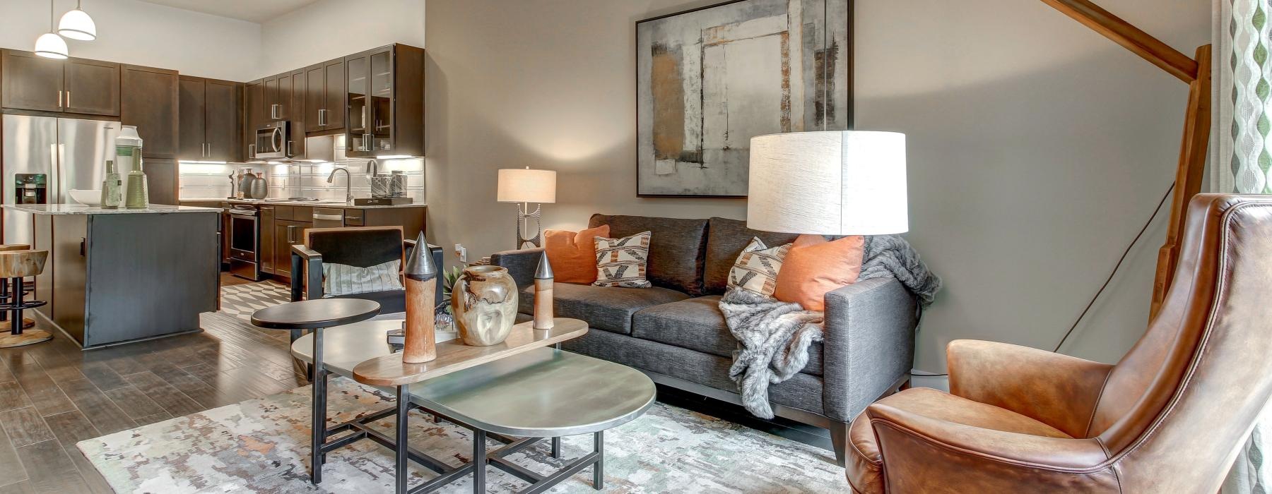 a living room with a couch and a table