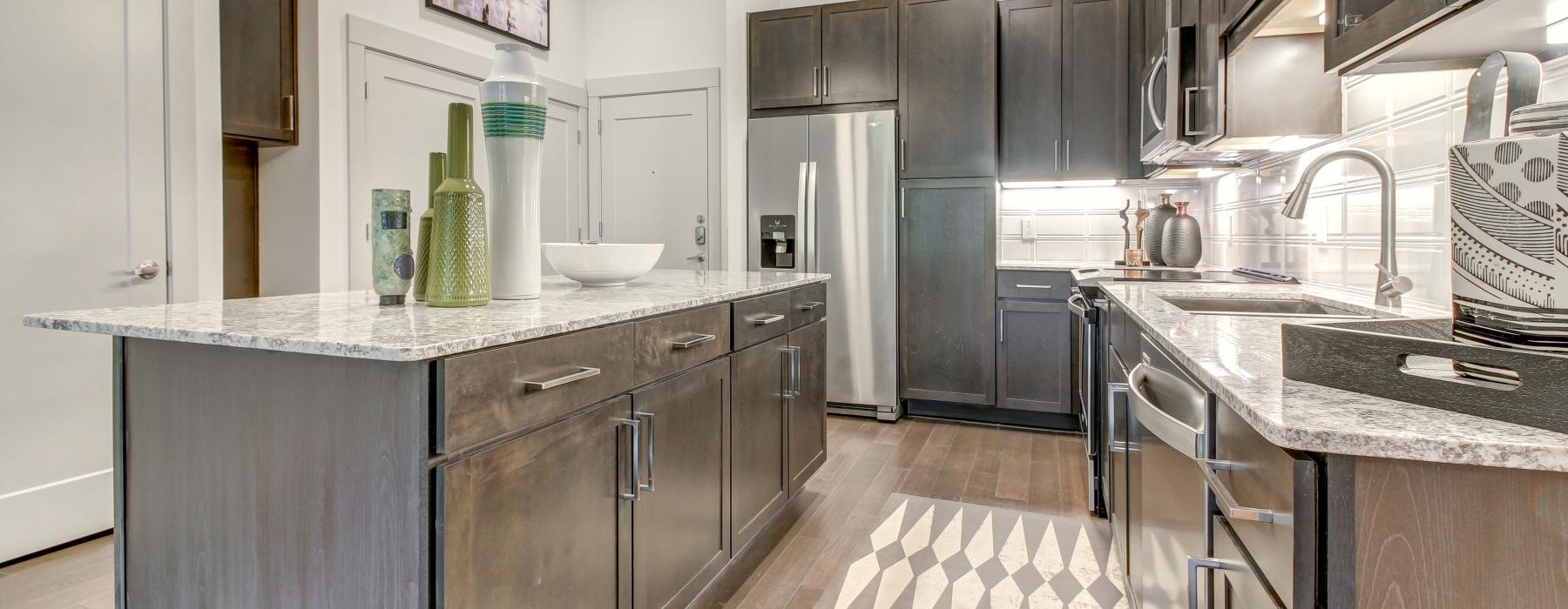 a kitchen with black appliances